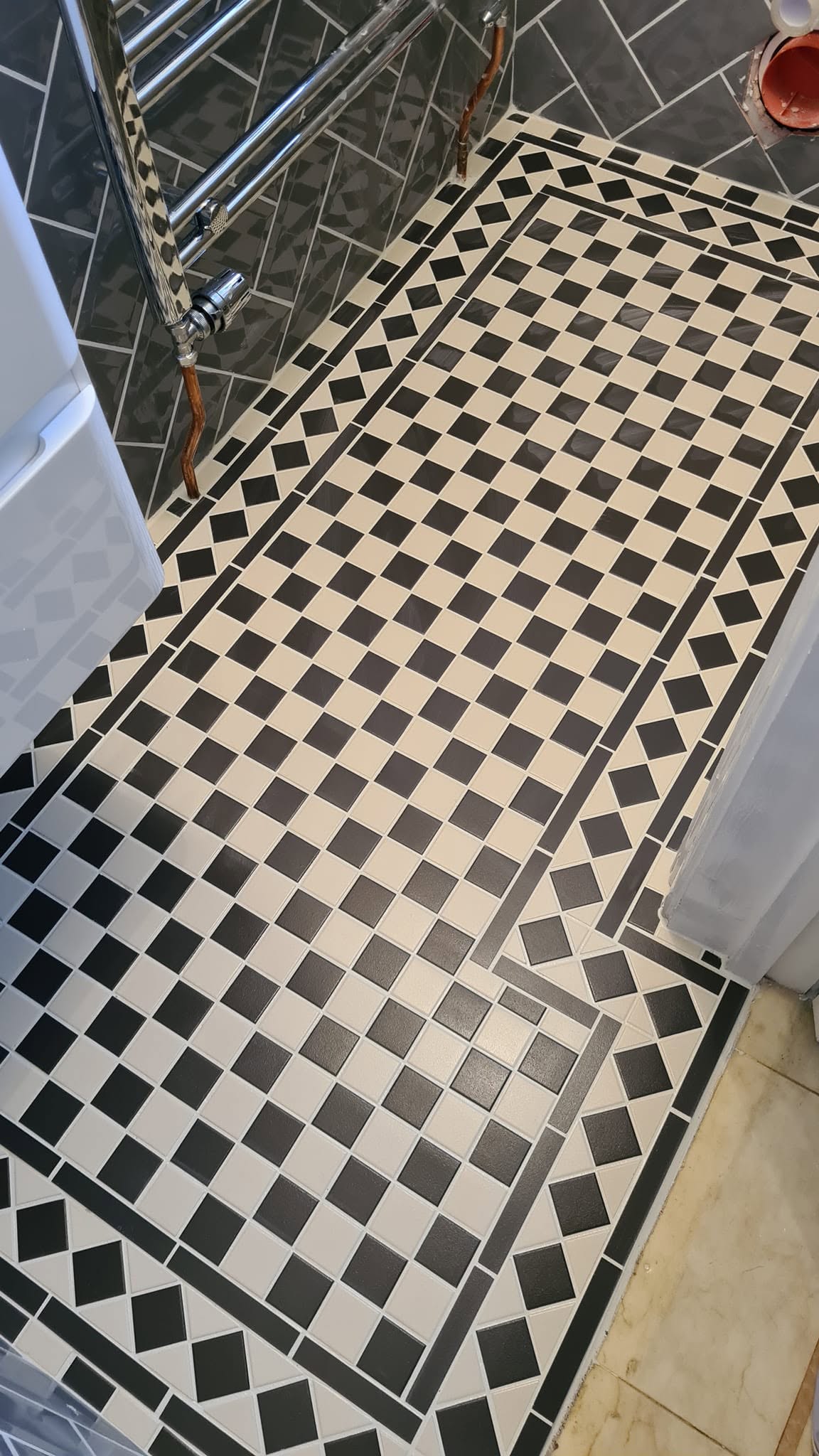 Bearsted: Mosaic tiled floor in new cloakroom