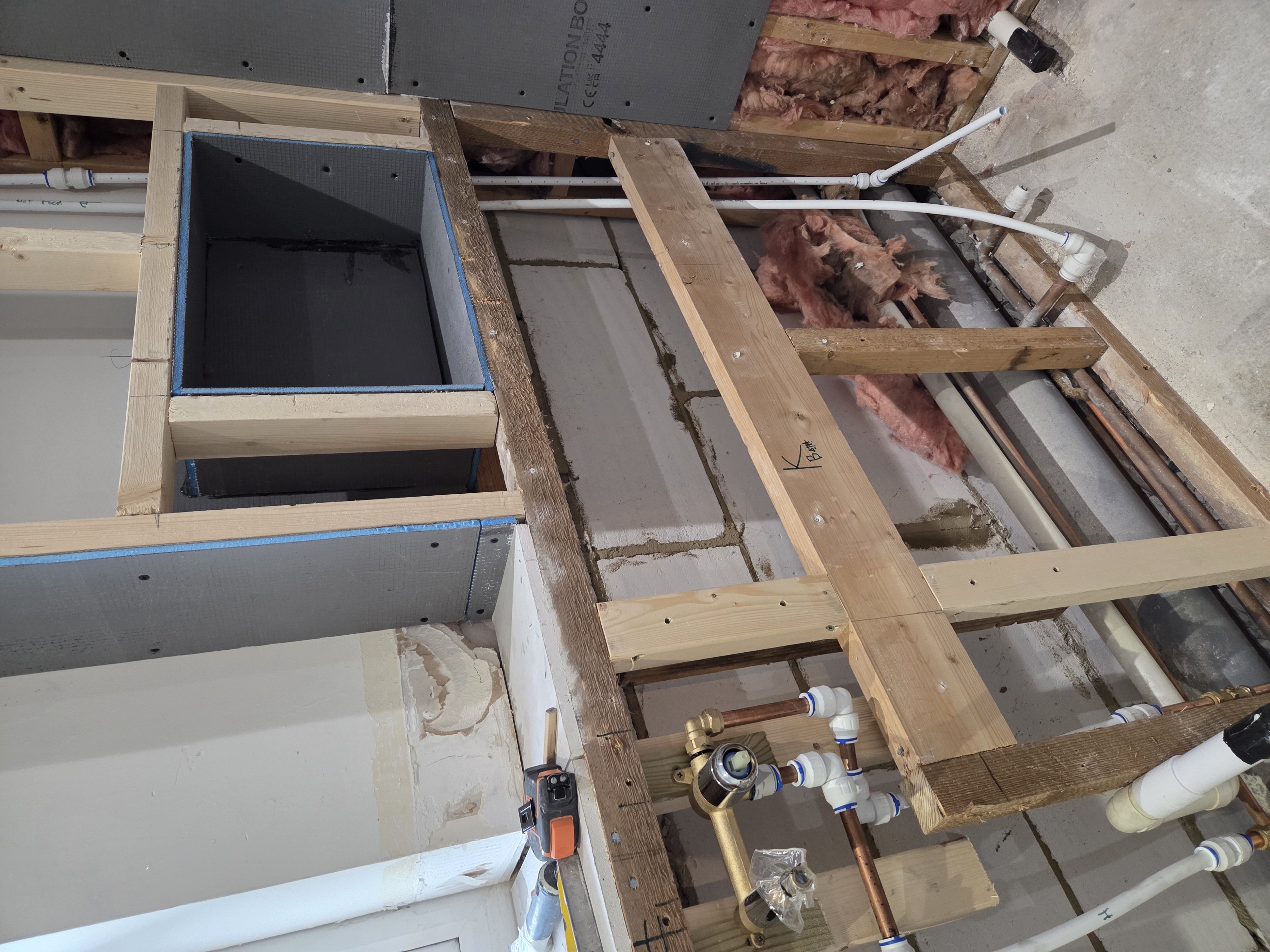 Wall mounted basin tap and bath filler plumbing